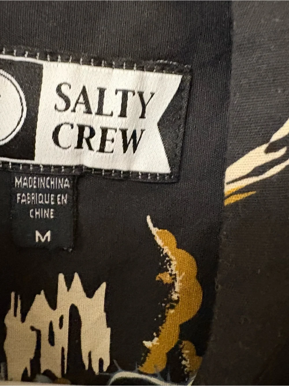 Salty Crew Black Short-Sleeve Button-Up Shirt with Blue & Gold Tropical Print